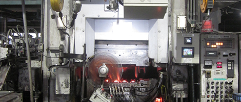 Precision forging using a crank press and hammer